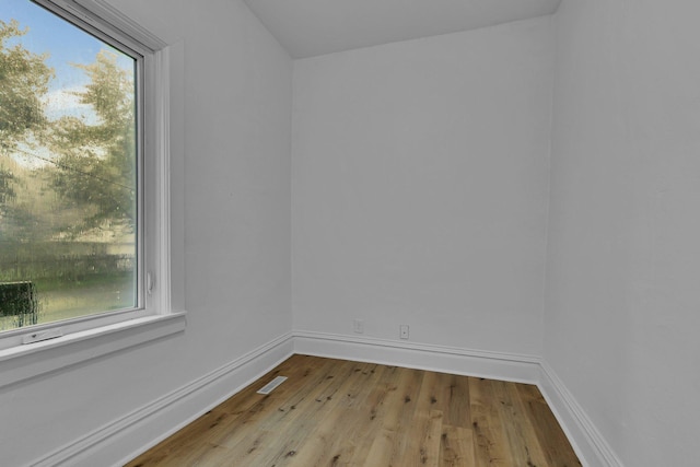 12 16th Ave N, Saint Cloud, MN 56303 - unfurnished room with wood finished floors and plenty of natural light