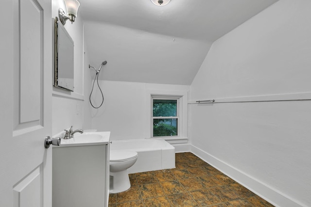 12 16th Ave N, Saint Cloud, MN 56303 - bathroom featuring vanity, vaulted ceiling, and stone finish flooring