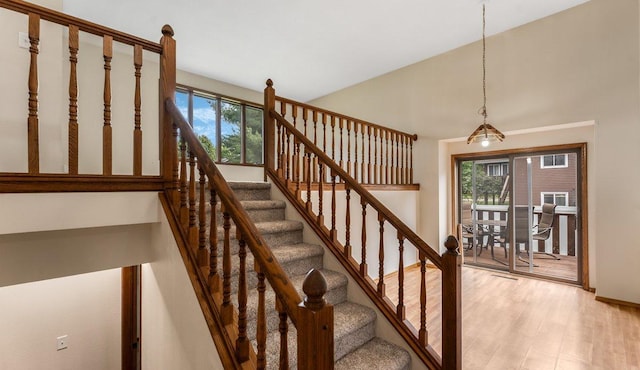 337 9 1/2 St N, Sauk Rapids, MN 56379 - staircase featuring healthy amount of natural light and wood finished floors