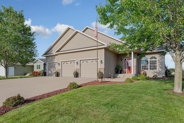 1904 Rock Ridge Ln, Saint Peter, MN 56082 - view of front of property with an attached garage, a front yard, and driveway