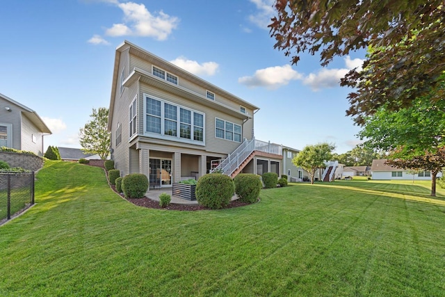 1904 Rock Ridge Ln, Saint Peter, MN 56082 - back of property with stairs and a patio area
