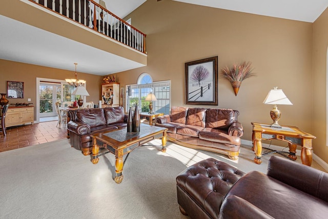 1904 Rock Ridge Ln, Saint Peter, MN 56082 - living area with a chandelier, tile patterned flooring, and high vaulted ceiling
