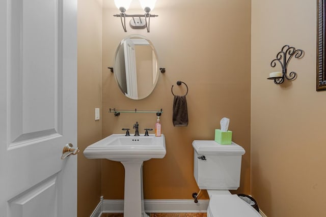 1904 Rock Ridge Ln, Saint Peter, MN 56082 - bathroom with toilet and baseboards