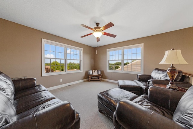 1904 Rock Ridge Ln, Saint Peter, MN 56082 - carpeted living room featuring a ceiling fan and baseboards