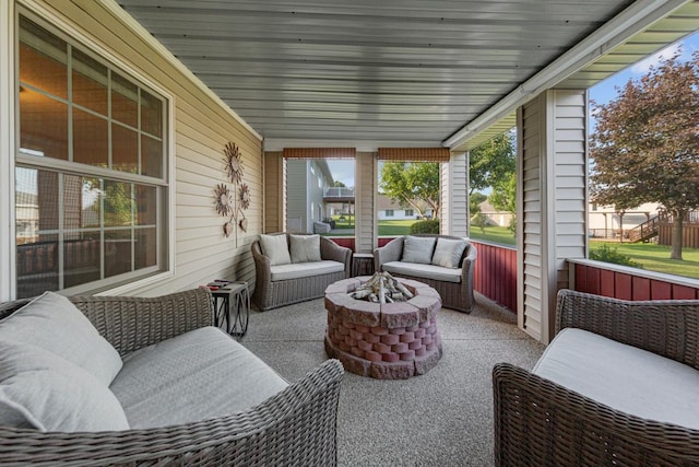1904 Rock Ridge Ln, Saint Peter, MN 56082 - sunroom with an outdoor living space with a fire pit