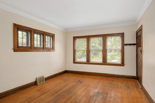 3809 41st Ave S, Minneapolis, MN 55406 - spare room with hardwood / wood-style floors and crown molding