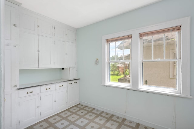 3809 41st Ave S, Minneapolis, MN 55406 - unfurnished dining area featuring plenty of natural light and light floors