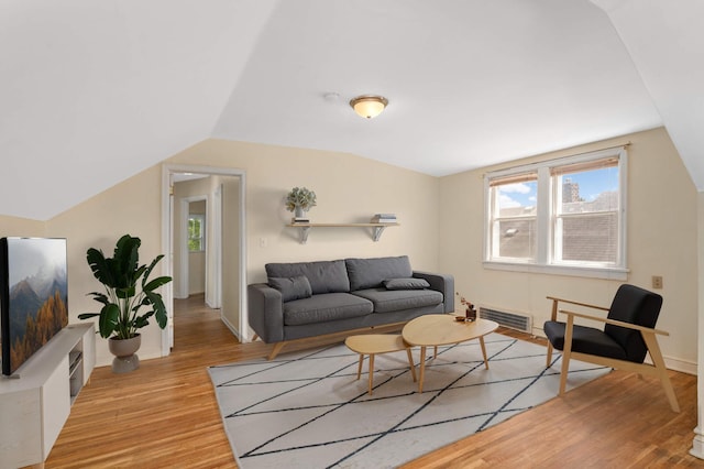 3809 41st Ave S, Minneapolis, MN 55406 - living room with light wood-style floors and vaulted ceiling