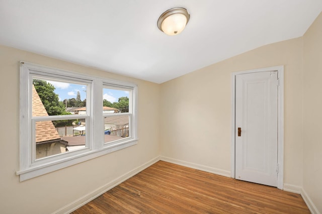 3809 41st Ave S, Minneapolis, MN 55406 - empty room featuring healthy amount of natural light and wood finished floors