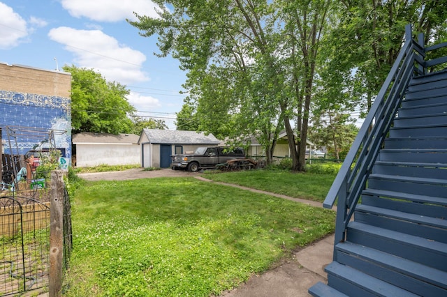3809 41st Ave S, Minneapolis, MN 55406 - view of yard with stairway and an outbuilding
