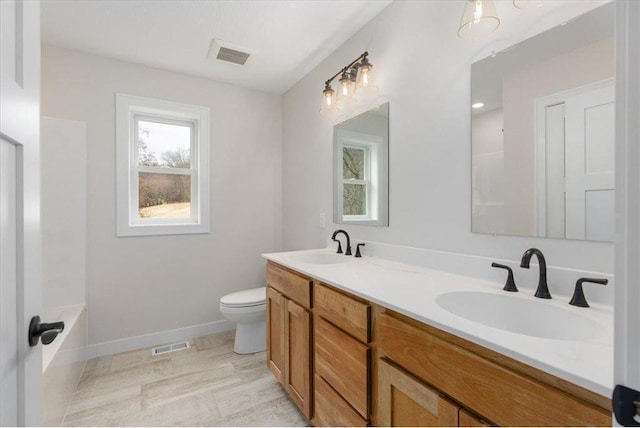 S1546 Shawnee Dr Unit B, Alma, WI 54610 - full bath featuring double vanity and tub / shower combination