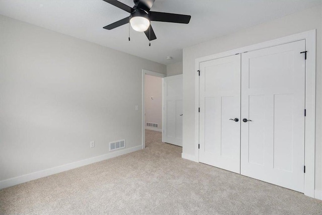 S1546 Shawnee Dr Unit B, Alma, WI 54610 - unfurnished bedroom featuring carpet floors, a closet, and a ceiling fan