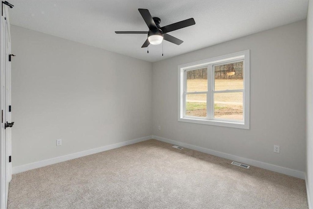 S1546 Shawnee Dr Unit B, Alma, WI 54610 - carpeted empty room with baseboards and ceiling fan