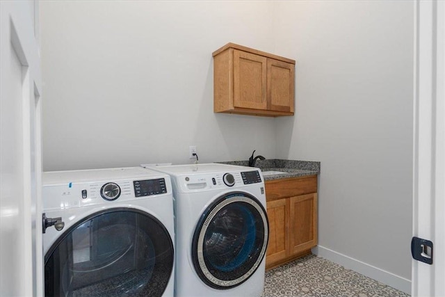S1546 Shawnee Dr Unit B, Alma, WI 54610 - laundry area featuring separate washer and dryer, cabinet space, and light floors