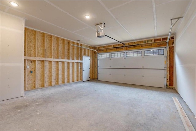 S1546 Shawnee Dr Unit B, Alma, WI 54610 - garage with a garage door opener and recessed lighting