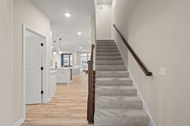 2570 Paddock Path, Shakopee, MN 55379 - staircase featuring wood finished floors and recessed lighting