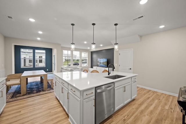 2570 Paddock Path, Shakopee, MN 55379 - kitchen featuring appliances with stainless steel finishes, open floor plan, recessed lighting, light wood-style floors, and a kitchen island with sink