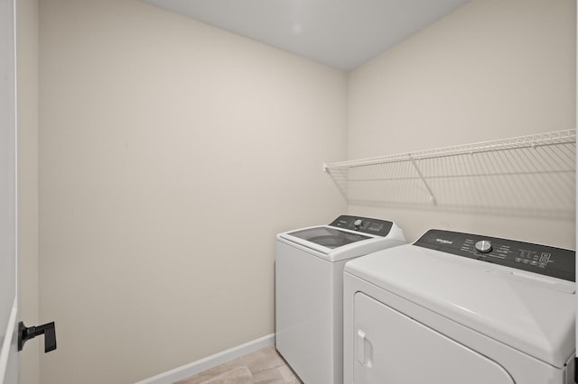 2570 Paddock Path, Shakopee, MN 55379 - washroom with independent washer and dryer and baseboards