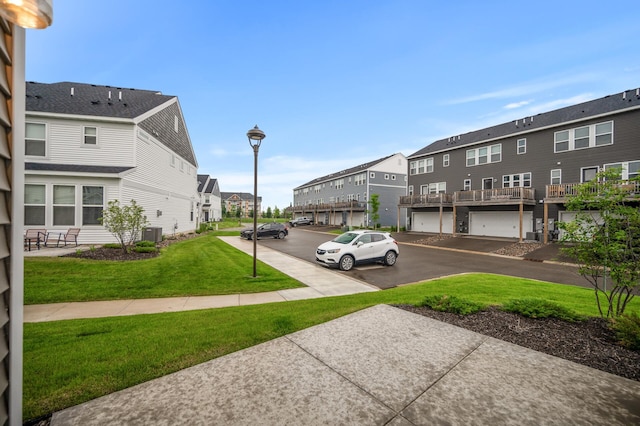 2570 Paddock Path, Shakopee, MN 55379 - view of asphalt road with a residential view and street lighting