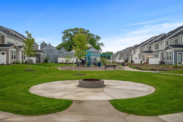 2570 Paddock Path, Shakopee, MN 55379 - view of community featuring a residential view, a yard, and a patio area