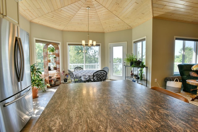 30534 County Highway 12, Dalton, MN 56324 - dining area featuring wood ceiling, plenty of natural light, and a chandelier
