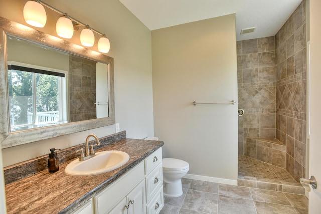 30534 County Highway 12, Dalton, MN 56324 - bathroom with vanity, a tile shower, and tile patterned floors