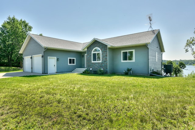 30534 County Highway 12, Dalton, MN 56324 - back of property with a lawn, driveway, an attached garage, and roof with shingles