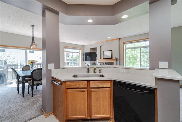 4363 Victor Path Unit 7, Hugo, MN 55038 - kitchen featuring dishwasher, light colored carpet, healthy amount of natural light, recessed lighting, and brown cabinets