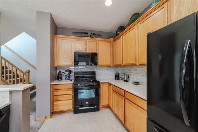 4363 Victor Path Unit 7, Hugo, MN 55038 - kitchen featuring black appliances, light countertops, tasteful backsplash, and a textured ceiling