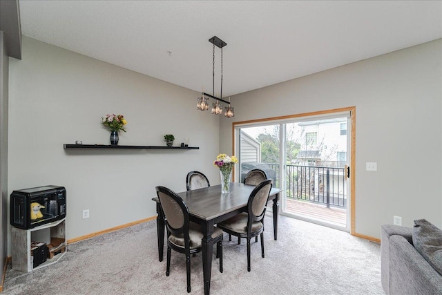 4363 Victor Path Unit 7, Hugo, MN 55038 - dining room featuring carpet and a chandelier