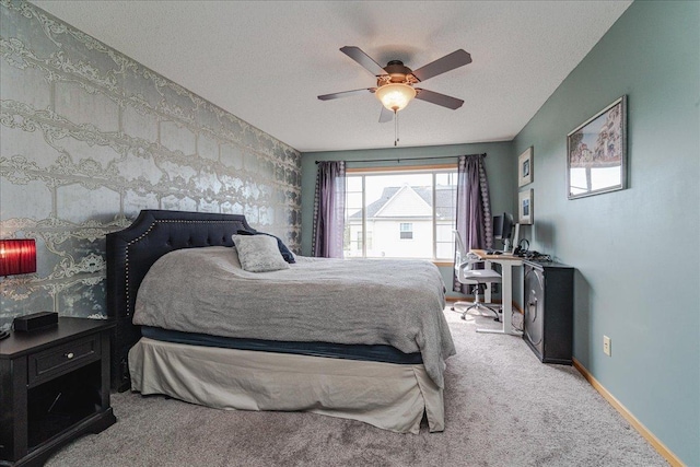 4363 Victor Path Unit 7, Hugo, MN 55038 - bedroom featuring a textured ceiling, carpet flooring, and ceiling fan