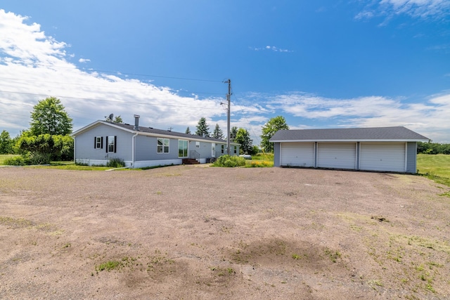 6257 State Highway 70, Rock Creek, MN 55063 - view of yard featuring a detached garage and an outdoor structure