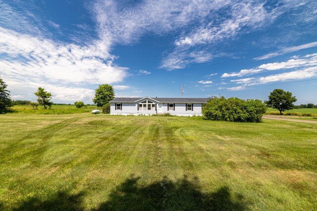 6257 State Highway 70, Rock Creek, MN 55063 - view of front of home with a front yard and a view of rural / pastoral area