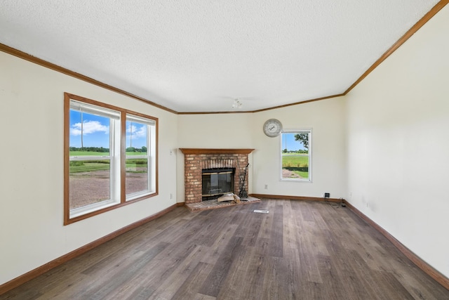 6257 State Highway 70, Rock Creek, MN 55063 - unfurnished living room with wood finished floors, crown molding, healthy amount of natural light, a fireplace, and a textured ceiling