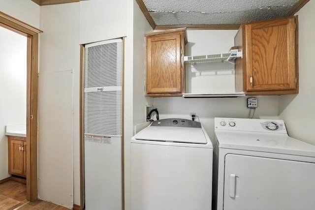 6257 State Highway 70, Rock Creek, MN 55063 - laundry area featuring cabinet space, washing machine and clothes dryer, and a heating unit