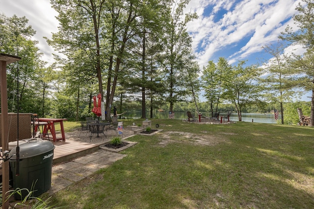 1618 Maple Shores Ln NE, Longville, MN 56655 - view of grassy yard featuring a deck with water view