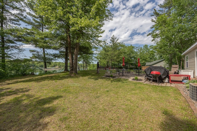 1618 Maple Shores Ln NE, Longville, MN 56655 - view of green lawn with a patio