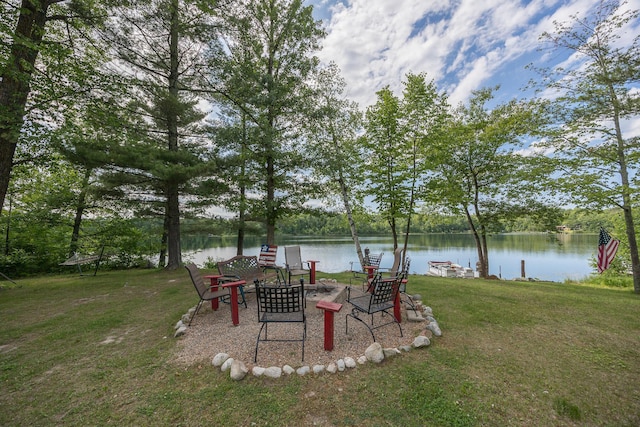 1618 Maple Shores Ln NE, Longville, MN 56655 - view of green lawn featuring a water view and an outdoor fire pit