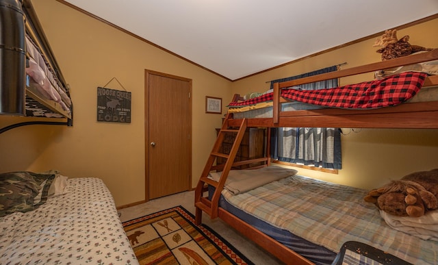 1618 Maple Shores Ln NE, Longville, MN 56655 - carpeted bedroom with ornamental molding and vaulted ceiling