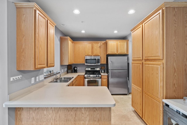 13659 Brick Path, Rosemount, MN 55068 - kitchen with appliances with stainless steel finishes, recessed lighting, light countertops, light brown cabinets, and a peninsula