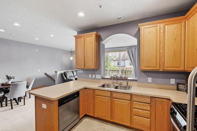 13659 Brick Path, Rosemount, MN 55068 - kitchen with appliances with stainless steel finishes, a peninsula, recessed lighting, a textured ceiling, and light countertops