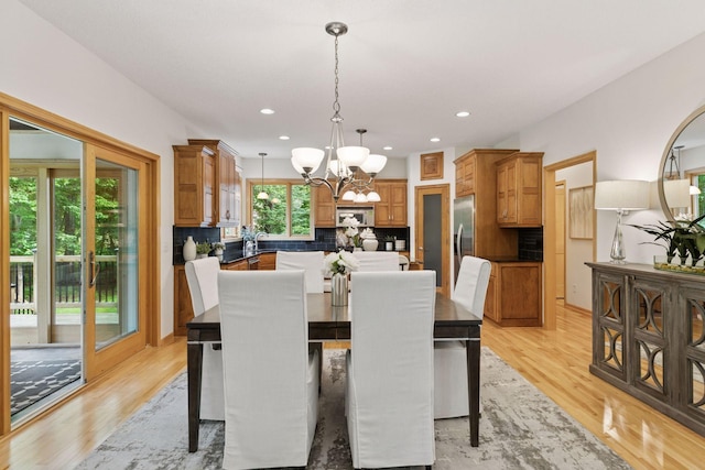 3027 135th Ave NE, Ham Lake, MN 55304 - dining area featuring a chandelier, light wood-type flooring, and recessed lighting