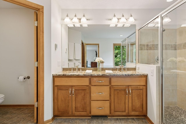 3027 135th Ave NE, Ham Lake, MN 55304 - bathroom with double vanity and a shower stall