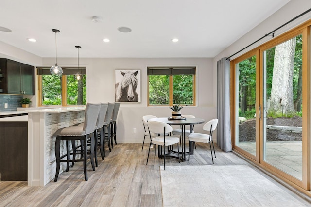 3027 135th Ave NE, Ham Lake, MN 55304 - dining room with light wood-style floors and recessed lighting