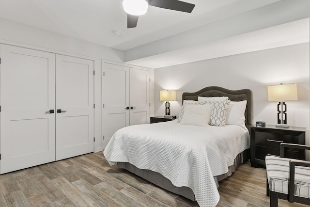 3027 135th Ave NE, Ham Lake, MN 55304 - bedroom featuring wood finished floors and a ceiling fan