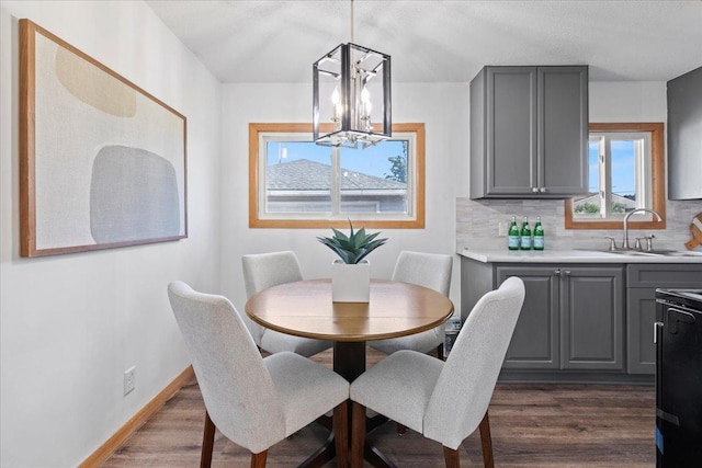 5738 Yates Ave N, Crystal, MN 55429 - dining room with dark wood finished floors and a chandelier