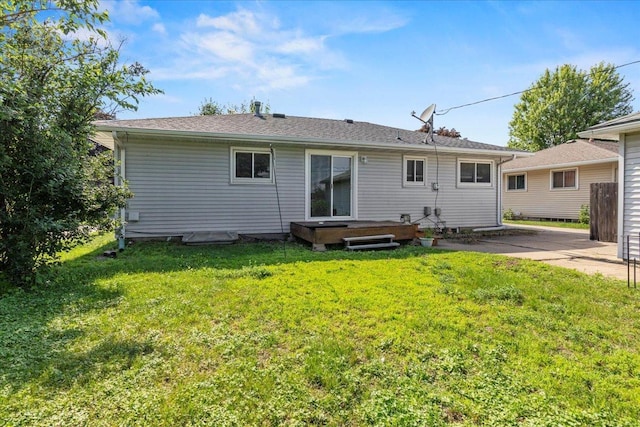 5738 Yates Ave N, Crystal, MN 55429 - back of house featuring a yard and a patio area