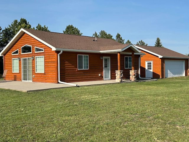 13492 Edgewood Ln SE, Mentor, MN 56736 - back of house with log veneer siding, a lawn, a garage, a patio, and a shingled roof