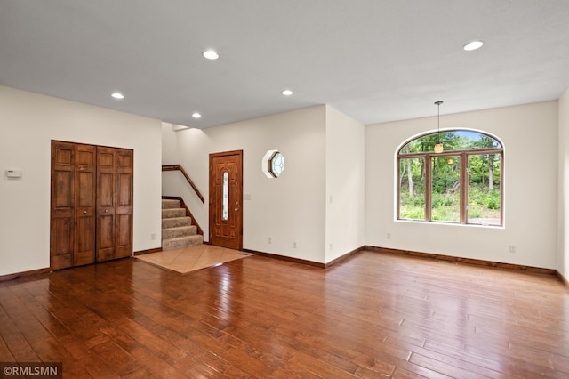 2117 Oakridge St, Saint Paul, MN 55119 - unfurnished room with hardwood / wood-style floors, stairs, and recessed lighting