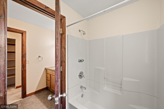 2117 Oakridge St, Saint Paul, MN 55119 - full bathroom featuring tub / shower combination, vanity, and tile patterned floors